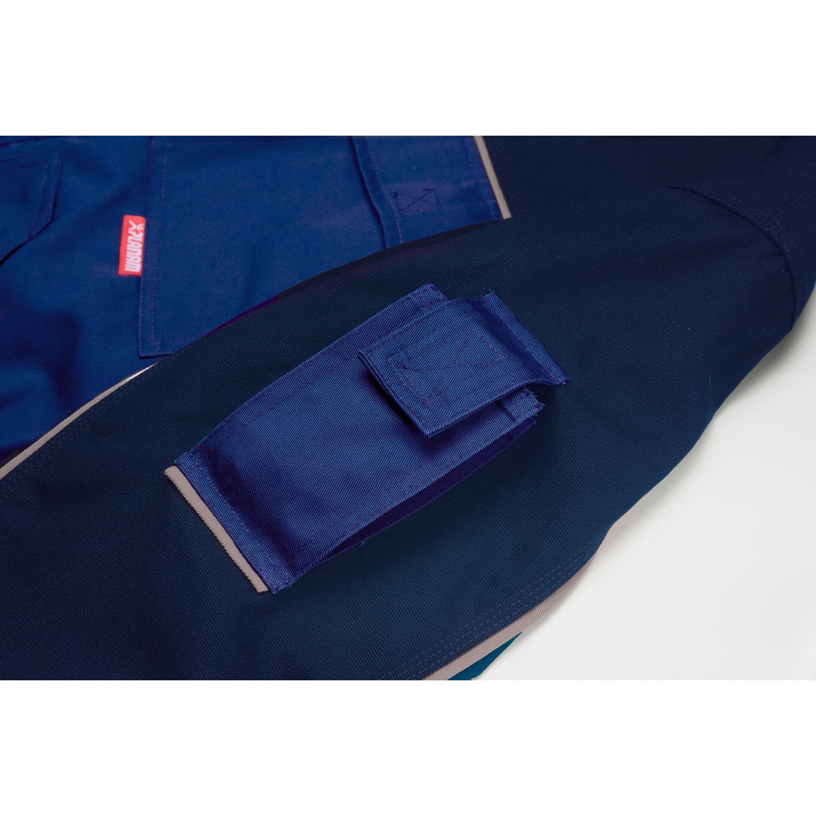 Planam Highline Waisted Jacket slate/black/red - The mobile phone pocket on the sleeve allows you to quickly access your smartphone.