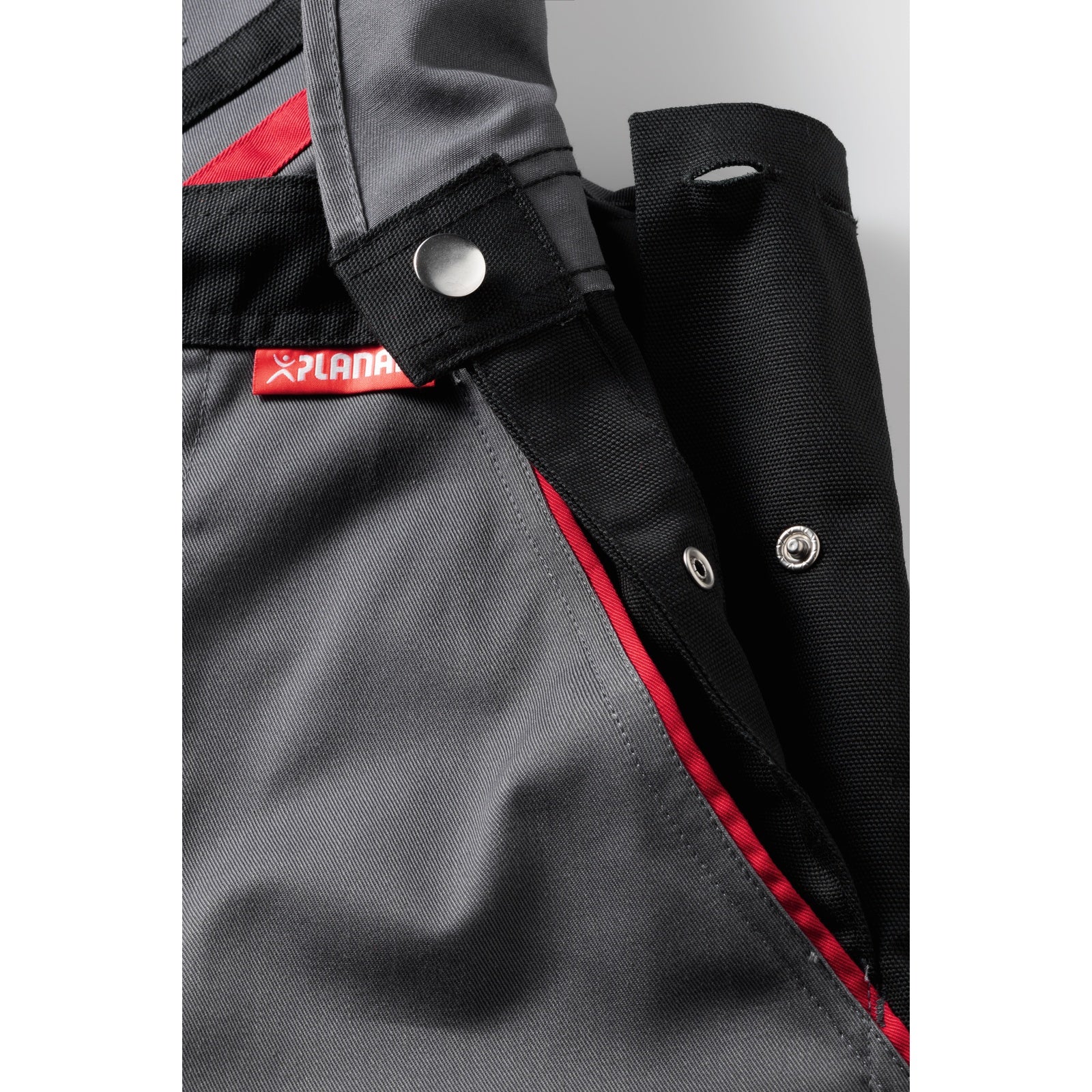 Planam Highline Dungarees slate/black/red - Greater freedom of movement thanks to the waistband adjustment on the sides