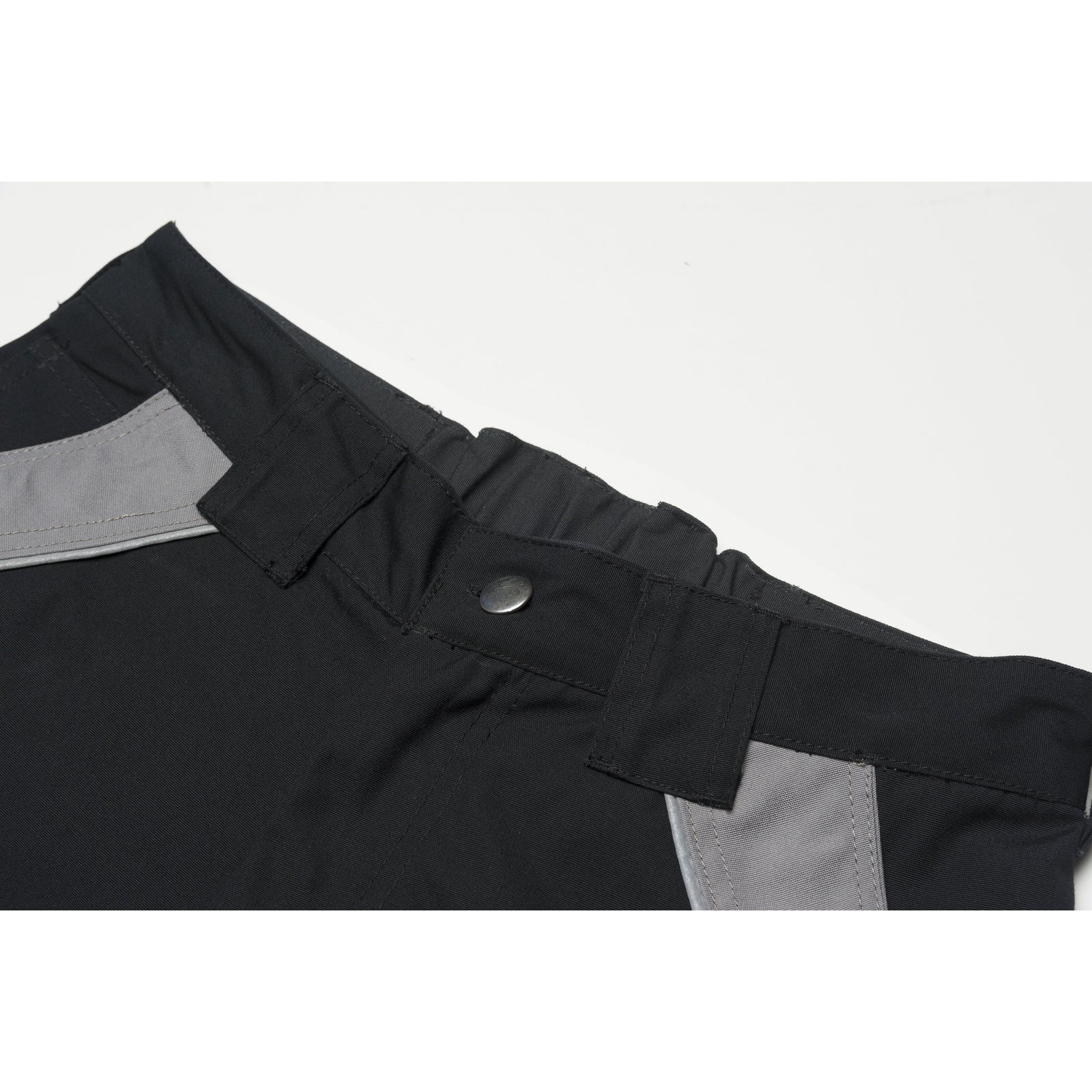 Planam Plaline Trousers green/black - The lower back stays warm thanks to the raised waistband.