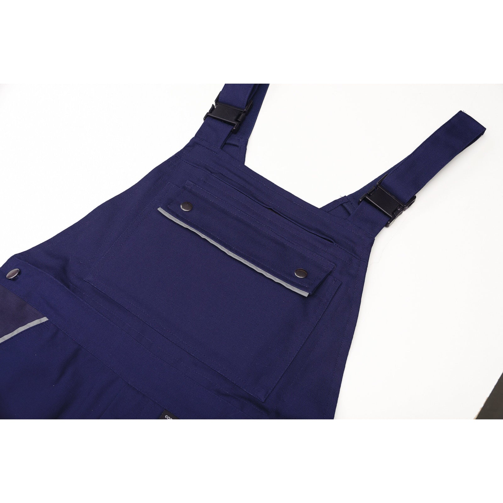 Planam Canvas 320 Dungarees black/black - Tools remain safe in the double bib pocket with zip closure.