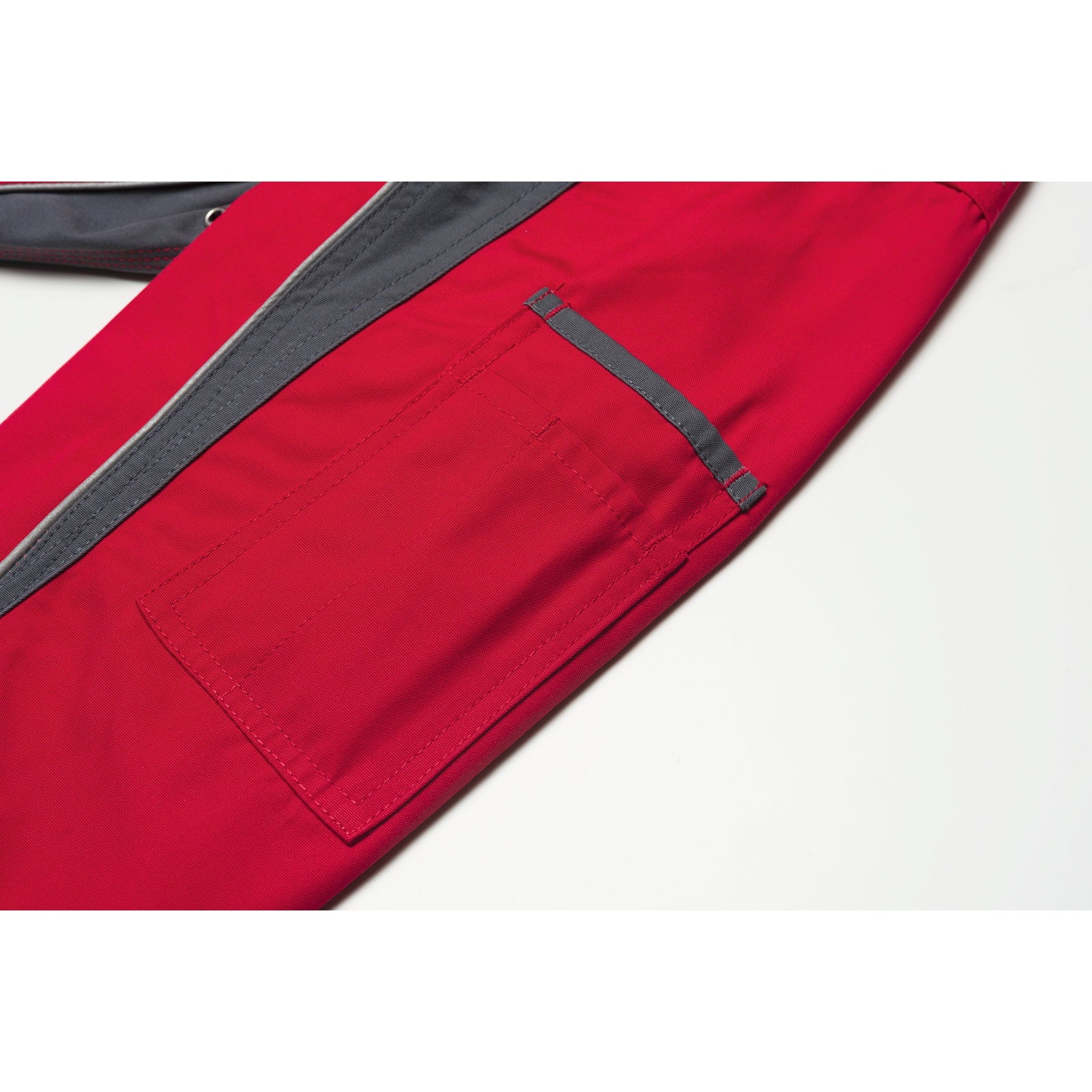 Planam Plaline Waisted Jacket red/slate - The sleeve pocket provides space for anything that needs to be put away quickly.