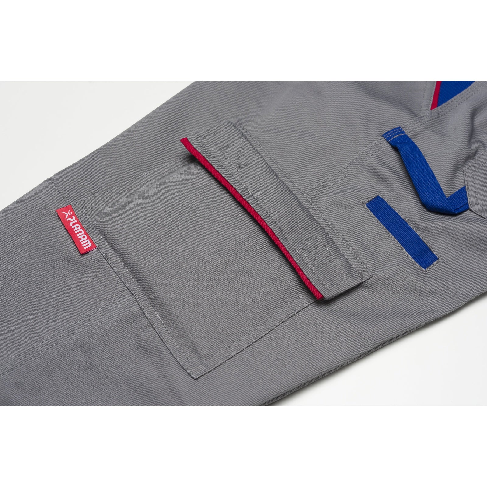 Planam Highline Trousers royal blue/navy/zinc - Everything in its place: The thigh pocket keeps your important tools to hand at all times.